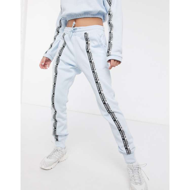 Adidas originals ryv taping sweatpants in white new arrivals