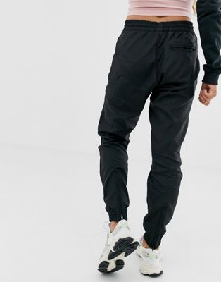adidas originals ryv taping track pants in black