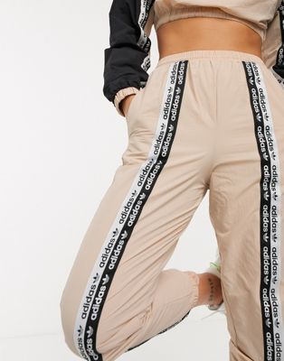 adidas ryv taping track pants
