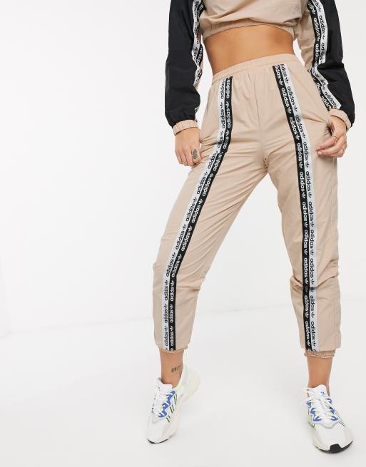 Adidas originals ryv taping shop track pants in black