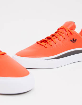 red adidas sneakers