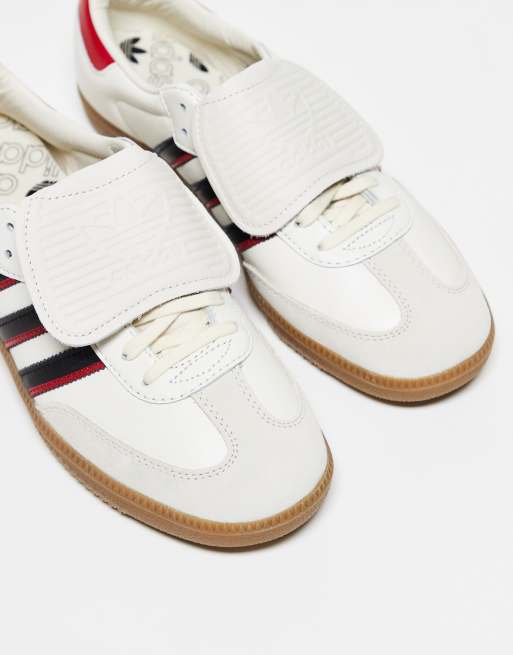 adidas Originals Samba LT sneakers in white with red heel tabs