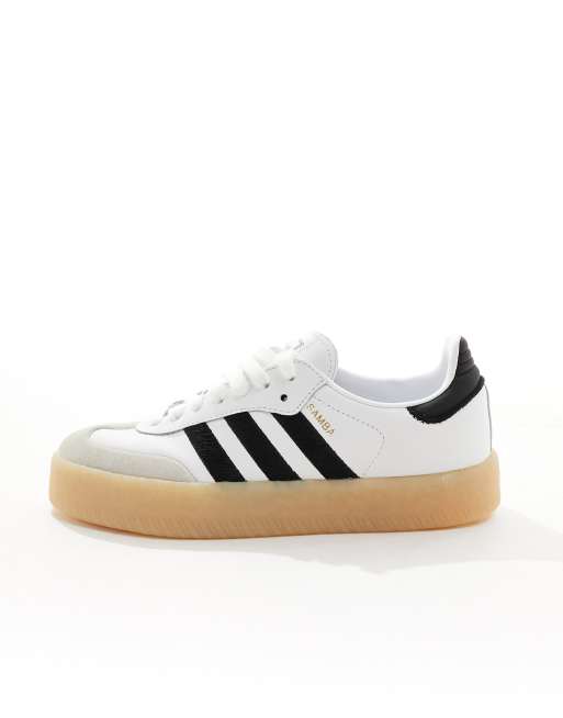 Adidas black store shoes white sole