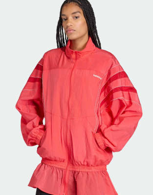 adidas Originals - Santiago - Trainingsoberteil aus Webstoff in Semi Lucid Red-Rot