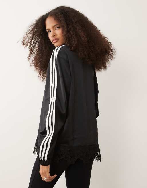 adidas Originals satin firebird track top with lace hem in black