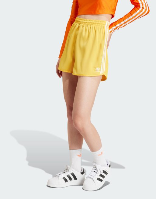 adidas Originals satin sprint shorts in yellow
