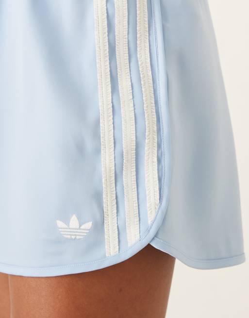 adidas Originals satin Sprinter shorts in blue with ruffle