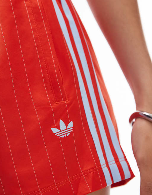 adidas Originals satin sprinter shorts in orange pin stripe