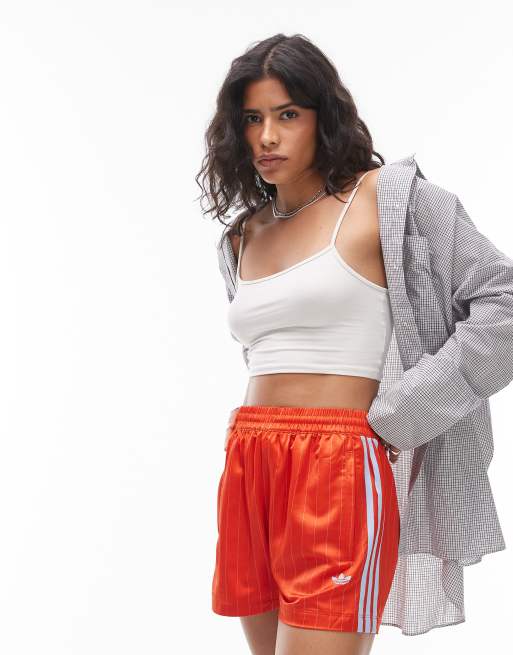 adidas Originals satin sprinter shorts in orange pin stripe