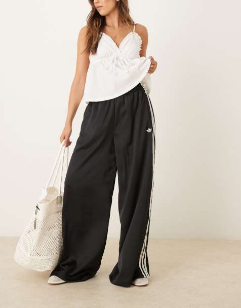 adidas Originals satin wide leg joggers in black with ruffle 3 stripe - view 1