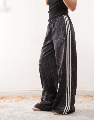 adidas Originals satin wide leg track pants in black leopard print 
