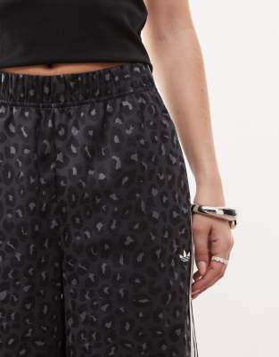 adidas Originals satin wide leg track pants in black leopard print 
