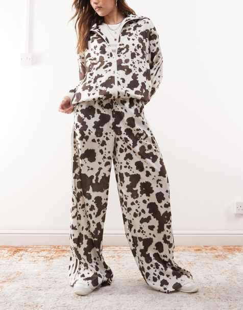 adidas Originals satin wide leg track pants in cow print - view 1