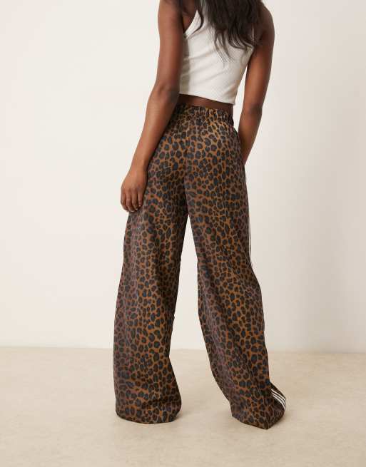 adidas Originals satin wide leg track pants in leopard print 