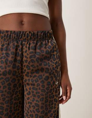 adidas Originals satin wide leg track pants in leopard print 