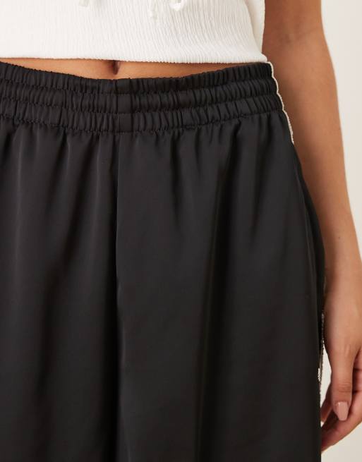 adidas Originals satin wide leg trackies in black with ruffle 3 stripe
