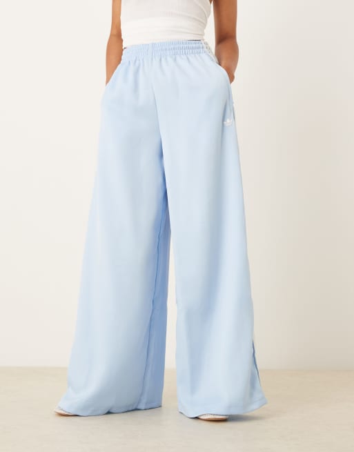adidas Originals satin wide leg trackies in blue with ruffle 3 stripe