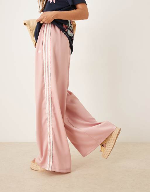 adidas Originals satin wide leg trackies in pink with ruffle 3 stripe