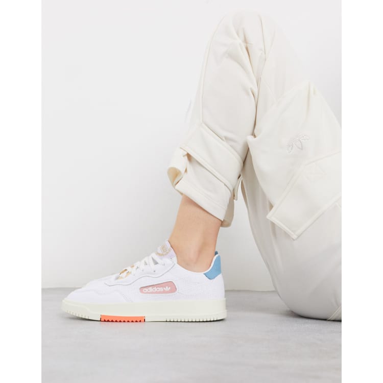 Pluche pop buitenste Gouverneur adidas Originals SC Premiere sneaker in white and pink | ASOS