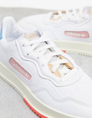 white sc premiere sneakers