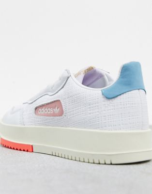 adidas originals sc premiere sneaker in white and pink