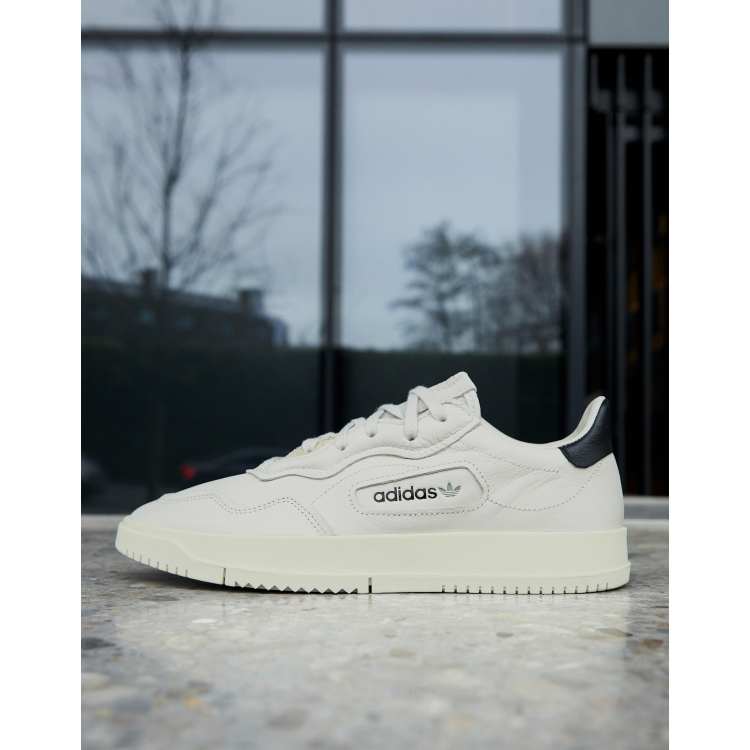 Adidas originals sc on sale premiere trainers off white