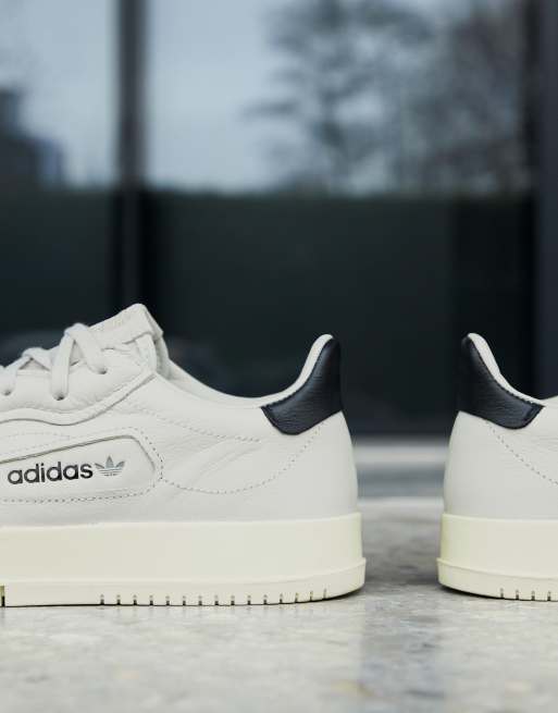 Adidas originals sc premiere sales trainers off white cg6239