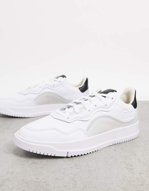 adidas Originals SC Premiere sneakers in white with curved panels
