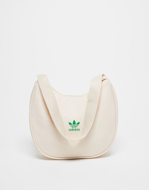 adidas Originals Schultertasche in gebrochenem WeiB mit Blumenmotiv ASOS