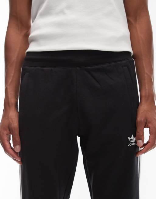 adidas Originals – Schwarze Jogginghose mit drei Streifendesign, 5 von 5