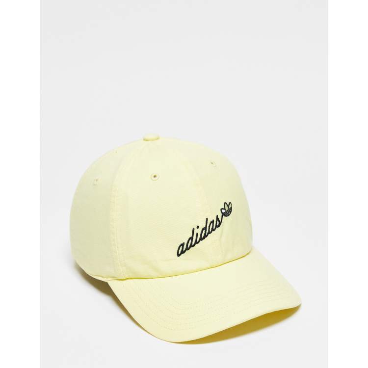 adidas Originals script logo cap in yellow | ASOS