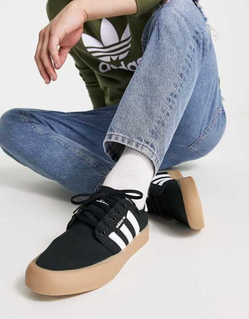 adidas Originals Seeley sneakers in black with gum sole ASOS