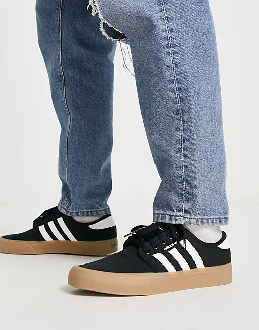 adidas Originals Seeley XT sneakers in black with gum sole | ASOS