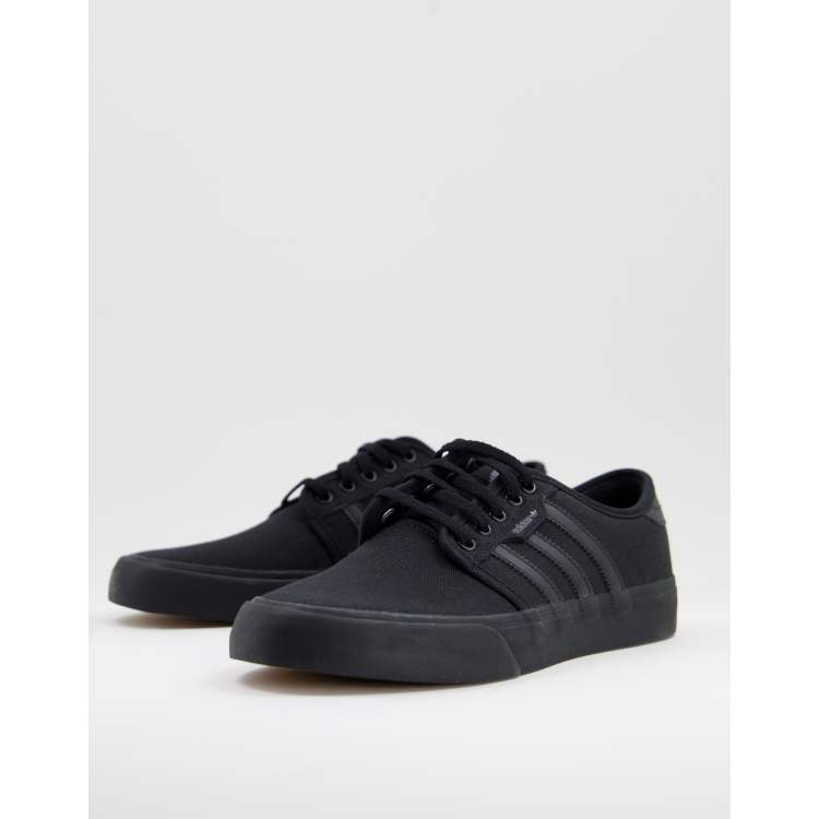 Adidas originals seeley black sneakers on sale