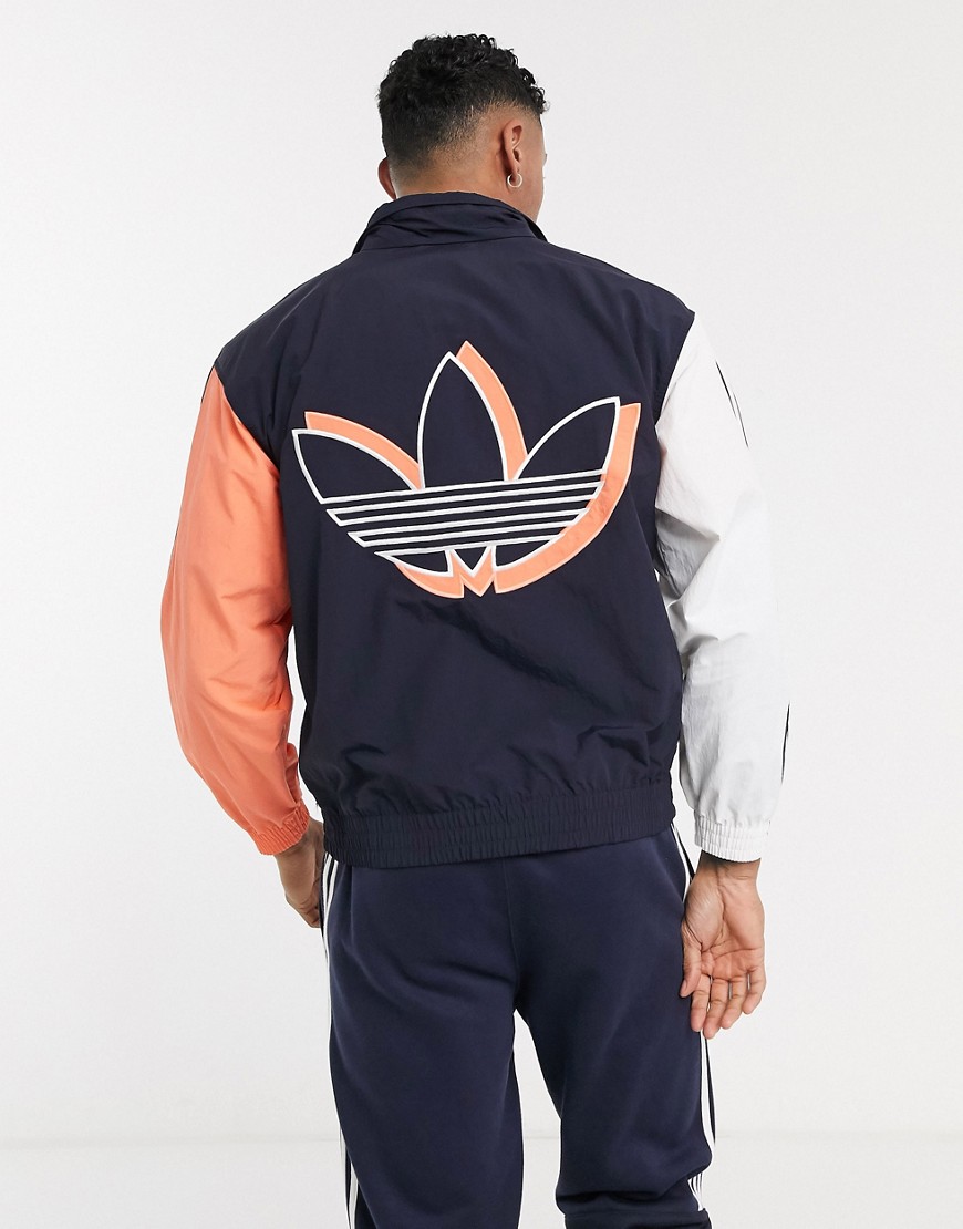 adidas Originals shadow track jacket with contrast sleeves in navy