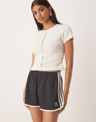 adidas Originals - Short de course à 3 bandes - Noir