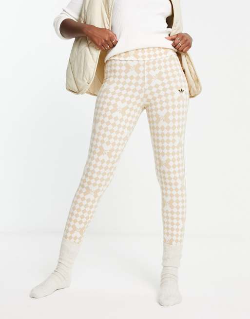 adidas Originals 'Ski Chic' printed stirrup leggings in cream and white