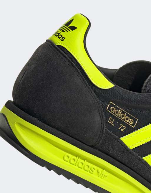 Black and yellow adidas trainers hotsell