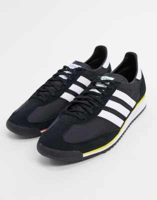 black suede adidas trainers
