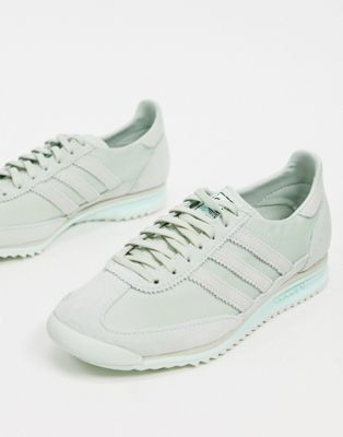 mint green adidas trainers