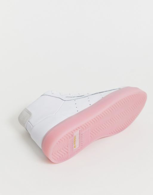 Adidas originals sleek mid top sneaker in white store and pink