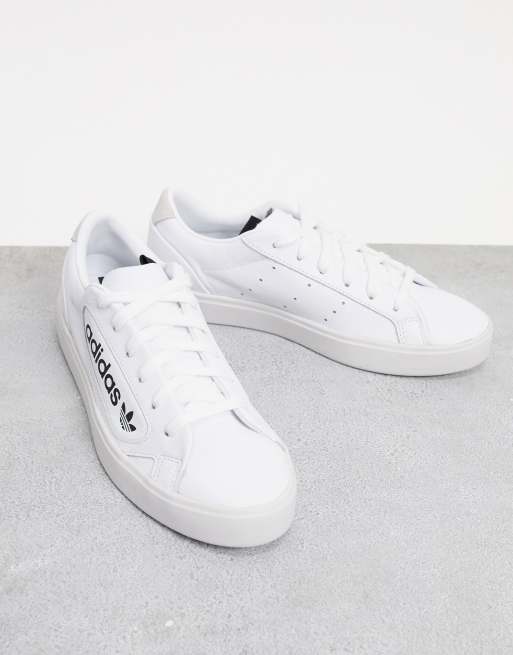 Adidas originals sleek over branded trainers in on sale white