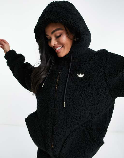 adidas Originals - Sort jakke i imiteret lammekind med guldfarvet logo
