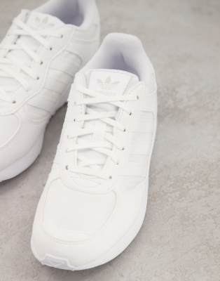 triple white adidas trainers