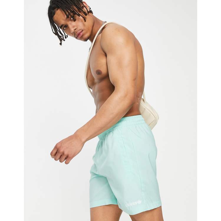Green adidas swim shorts discount