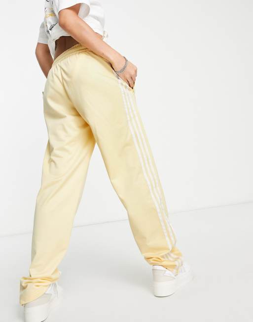 adidas Originals 'Sports Resort' three stripe wide leg track pants in  yellow