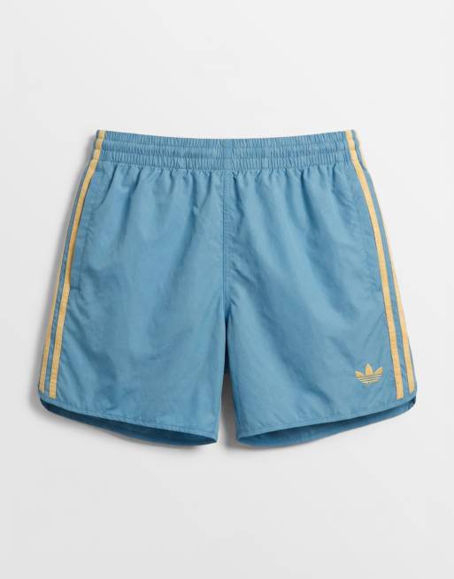 adidas Originals - Sprinter - Pantaloncini blu e arancioni, 6 di 7
