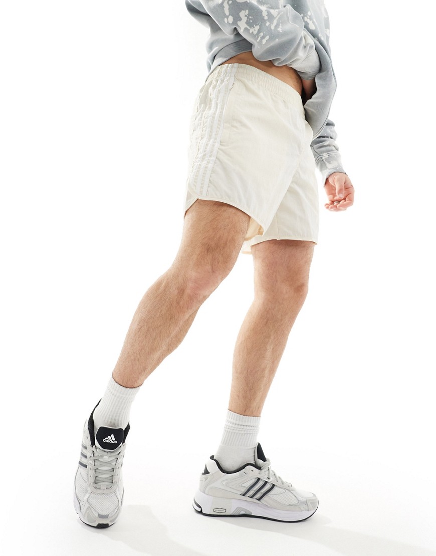 adidas Originals sprinter shorts in off white