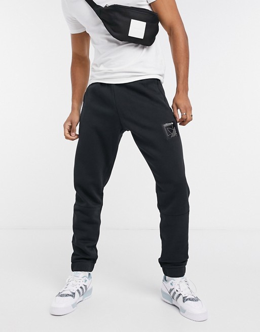adidas Originals SPRT logo joggers in black