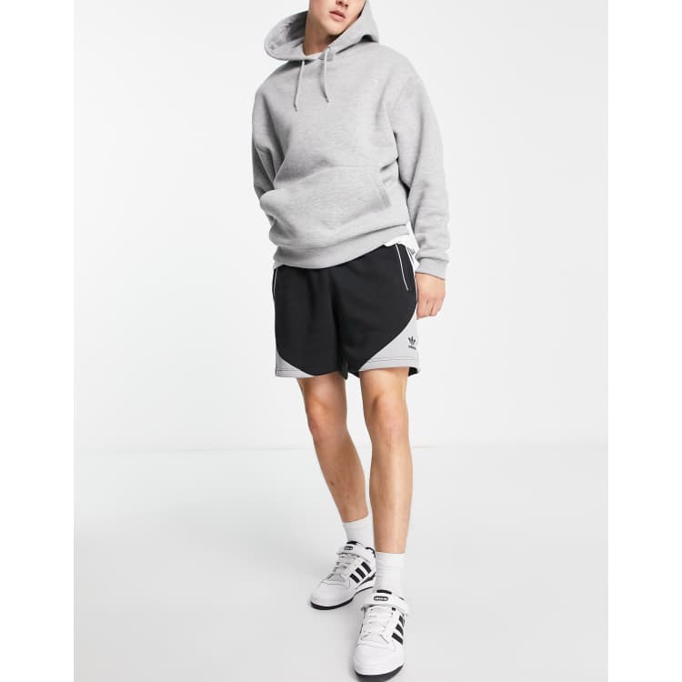 Pantaloncini adidas bianchi top con strisce nere